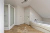 Groot hoekbad en douche 