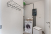 Berging/wasplaats met aansluiting voor wasmachine en droogkast