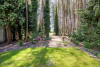 Achter de woning bevindt zich 1 hectare weiland en bos 