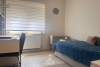 Derde slaapkamer met laminaatvloer