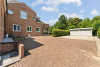 Dubbele garagebox met tuinberging