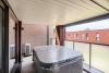 Overdekt terras met jacuzzi 
