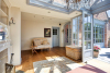 Lichtrijke orangerie met open haard 