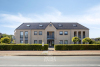 Gelijkvloers ruim appartement